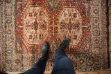 Plush hand-knotted Turkish Tulu rug pile in rust, ivory, and blue with medallion abrash.