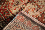 Vintage Tulu rug with plush abrash pile, geometric hand-knotted foundation, and fringe.