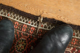 Partially intact goat hair selvage and geometric border on a vintage Afghani Bokhara rug.