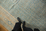 Distressed vintage Birjand carpet with powder blue Herati field and beige inverted turtle border.