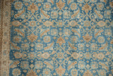 Distressed Birjand carpet, faded blue Herati design with beige inverted turtle border.