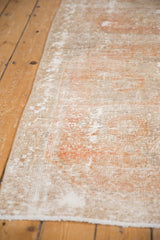 Distressed Oushak rug runner pile showing pale terra cotta, silver, and ivory tones.