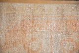 Vintage distressed Oushak rug pile texture, with mostly even wear and pale terra cotta, silver, ivory.