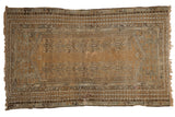 Antique hand knotted Turkish Kula rug with beige, camel, charcoal field, stylized plant motifs, layered borders.