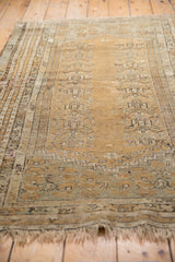 Antique Kula rug's central field with germinating plant motifs and mostly even wear.