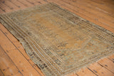 Secure fringe and multi-layered Kula rug border with pearl motif and aged beige tones.