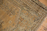 Antique Kula rug corner with multi-layered borders, inverted coloration, pearl motif, and foundation wear.