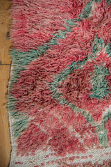 Detail of the Moroccan carpet's intact side cord selvage, ivory foundation, and plush pile.