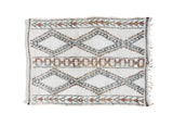 Hand knotted vintage Moroccan carpet, ivory field with geometric diamond panels in charcoal, rust, saffron.