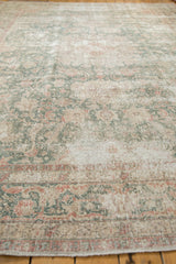 Distressed Sparta carpet, mostly even wear, visible foundation, faded ocean green, blush.