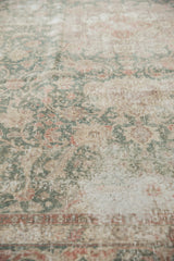 Distressed vintage Sparta rug texture with exposed foundation, ocean green, faded raspberry.