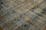 Distressed vintage Turkish Sparta rug, showing faded dusty navy motifs and visible foundation.