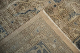 Distressed vintage Turkish Sparta carpet corner, showing exposed foundation and original selvage.