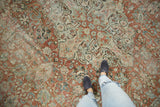 Textural pile of distressed vintage Mahal carpet, showing floral patterns and rich abrash.