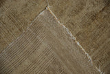 Distressed Turkmen rug pile, foundation showing through, with tattered woven backing.