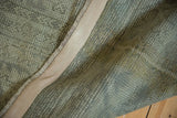 Hand-knotted reverse, showing intact side cord selvage on a vintage Turkish Oushak rug.