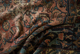 Textural contrast of faded raspberry red and navy blue fields with worn Harshang Herati motifs.