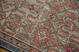 Distressed vintage Hamadan runner: faded terracotta Herati motifs, oxidized silver, visible pile wear.