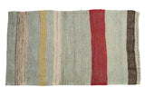 Polychromatic vintage Turkish Kilim rug with powder blue, dusty gold, cherry red, and charcoal stripes.