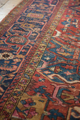 Vintage Karaja rug featuring geometric field, samovar border, and painted gem-tone colors.
