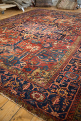 Vintage Karaja rug detail: navy blue samovar border, cherry red and dusty gold field.