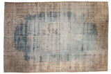 Vintage Distressed Sparta carpet, faded denim blue and antique ivory, with wear to foundation.