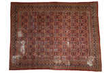 Vintage Persian Mahal carpet, circa 1920s, dusty red, allover henna plant design, visible wear.