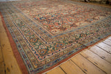 Intact pale rust selvage and rare dusty emerald green border on an antique Sultanabad carpet.