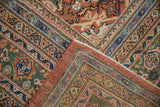 Antique Sultanabad carpet corner revealing dense hand-knotted weave and pale rust side cord.