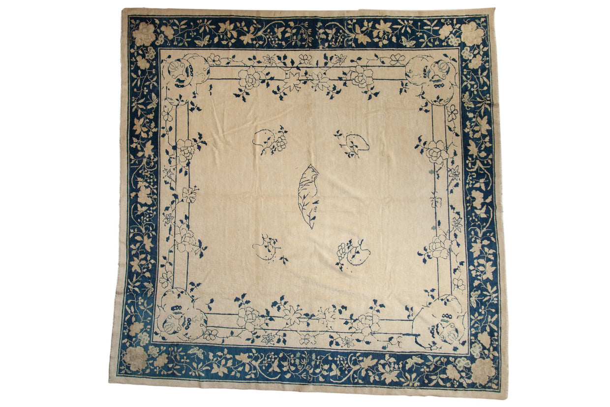 Antique Peking square carpet, ivory field, blue floral vinery, corner butterflies. 10x10 ft.