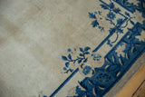 Vintage Chinese Peking rug border with cobalt blue floral vines on an ivory field.