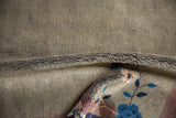 Plush, even pile with delicate dusty mauve and cobalt blue vinery on a vintage Peking carpet.