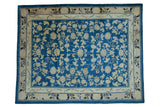 Antique Chinese Peking carpet with sprawling ivory vinery, blossoms, and cloudband motifs on sky blue.