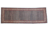 Vintage distressed Persian Serbend runner with an allover boteh pattern in sapphire blue, ruby red, and ivory.