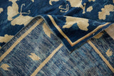 Ivory floral motifs on cobalt blue pile, revealing hand-knotted foundation and secured selvage.