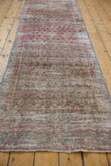 Distressed Malayer runner detail showcasing repeating boteh pattern with softened blush and silver texture.