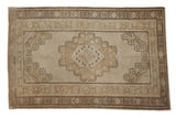 Vintage Distressed Oushak rug with beige and oxidized silver medallion, wide geometric borders, 4x6.