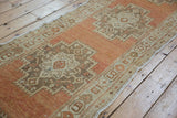 Distressed Oushak runner, terra cotta, beige, sandalwood geometric motif, intact selvage.