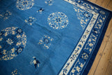 Vintage Peking carpet border with ivory pictorial lotus flowers and indigo blue vines.