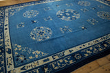 Even pile of sky blue Peking rug, featuring ivory roundel medallions and border.