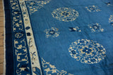 Vintage Peking carpet border featuring pictorial vines, lotus flowers, and butterflies.