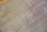 Distressed texture of Sparta carpet, with worn knot heads exposing the foundation.