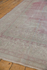 Distressed vintage Sparta carpet pile worn to foundation, showcasing faded raspberry, ivory, beige tones.