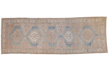 Distressed Serab runner with faded blue and neutral hexagonal medallions, 4x11.5 feet.