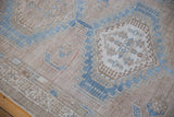 Distressed Serab runner corner with abrashed powder blue and sand geometric motifs.