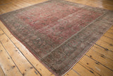 Distressed Sparta carpet border displaying faded floral cross sections and restored selvage.