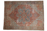 Distressed vintage Heriz rug, faded brick red and denim blue starburst medallion, 7'9