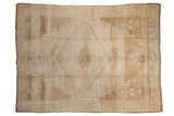 Vintage Distressed Kars carpet, large diamond medallion, abrashed ivory, beige, coffee brown.