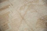 Distressed texture with abrashed ivory, beige, and sand tones on short pile.