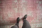 Soft rose blush distressed Turkish Sparta carpet with worn ivory florals.